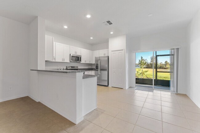 Building Photo - Luxury 3 BR + LOFT/2.5BA/1 Car Garage Luxury Townhome in the highly desirable GATED community of ...