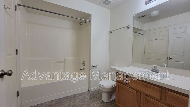 Building Photo - 8083 N Ridge Loop E