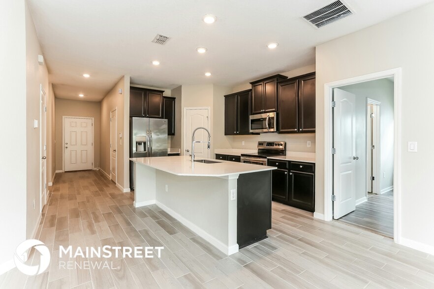 Building Photo - 9689 Lemon Grass Ln