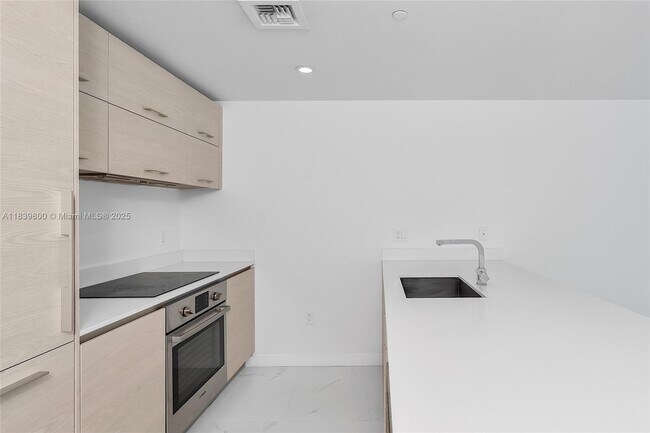 Building Photo - 1300 S Miami Ave