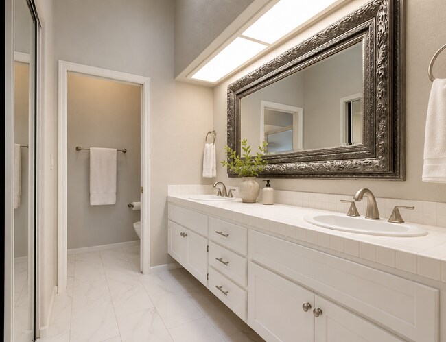 Building Photo - Welcome to your dream home in a serene coastal community! Spacious Updated Home with Designer Fin...