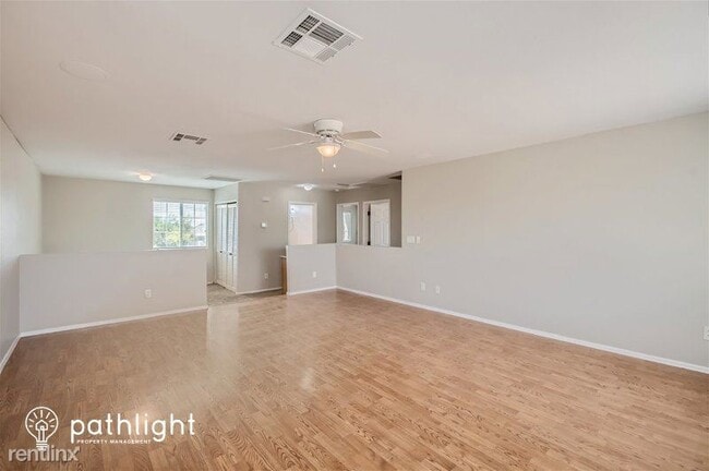 Building Photo - 4 br, 2 bath House - 22264 W Desert Bloom ...