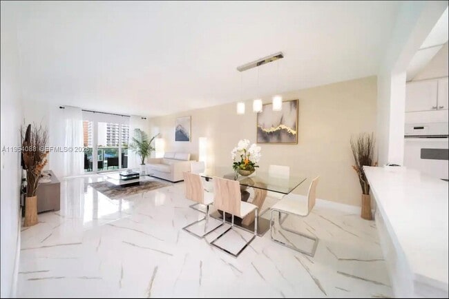 Building Photo - 19370 Collins Ave