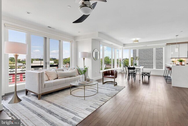 Building Photo - Sunny & Spacious NoMa penthouse with off-s...