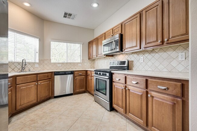 Building Photo - Spacious 3-Bedroom Home Featuring Downstai...
