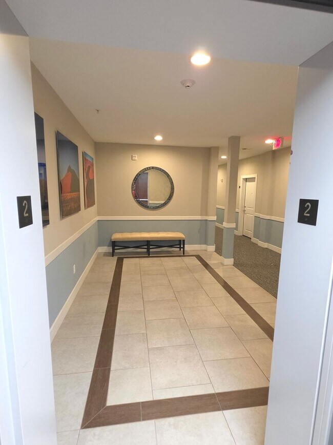 Building Photo - Beautiful 2nd floor (with elevator services) condominium: 2-bed, 2-bath, beautiful kitchen, bonus...