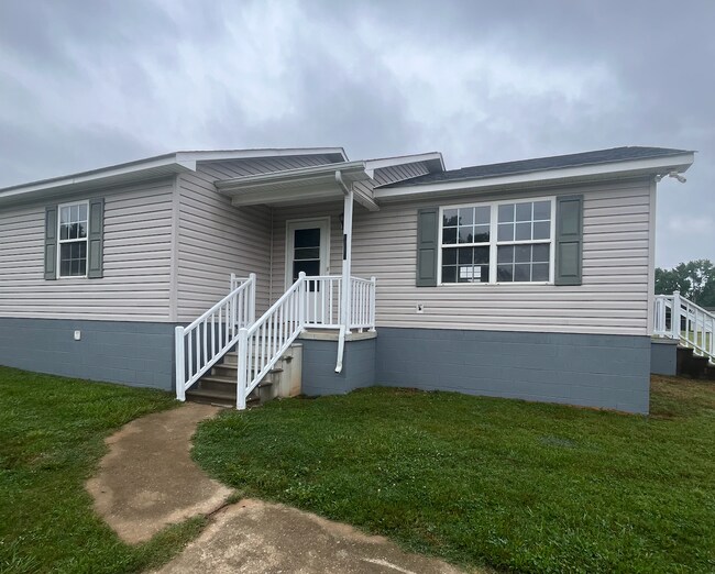 Building Photo - 6886 Reidville Rd