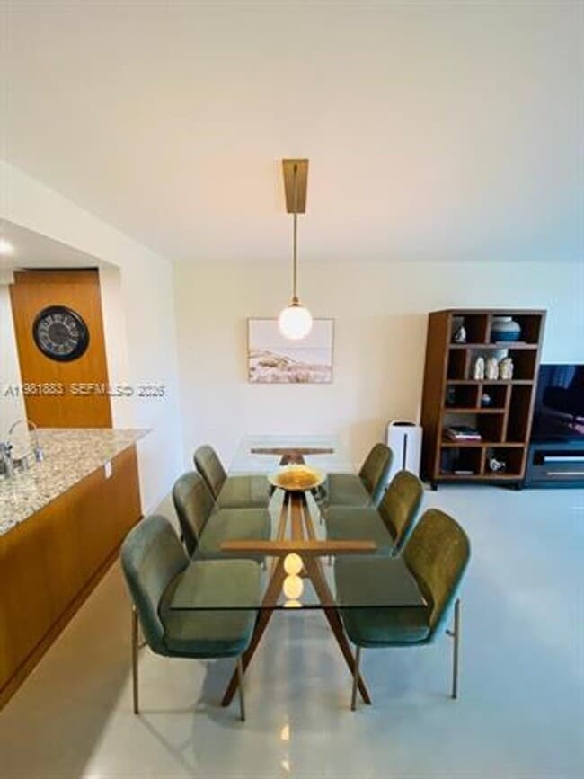 Building Photo - 10275 Collins Ave