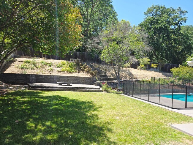 Building Photo - Stunning 4BD + Office Home with Pool in Li...