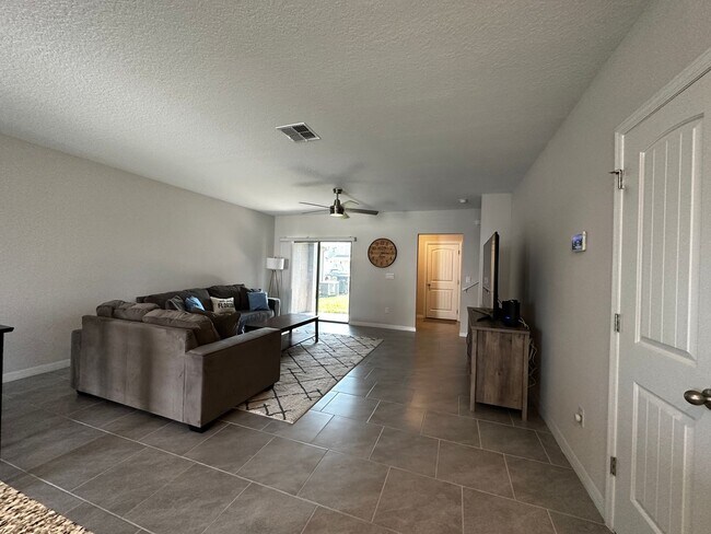 Building Photo - Resort Style Living! Stunning 3/2.5 Townhome in Waterleigh! Available April!