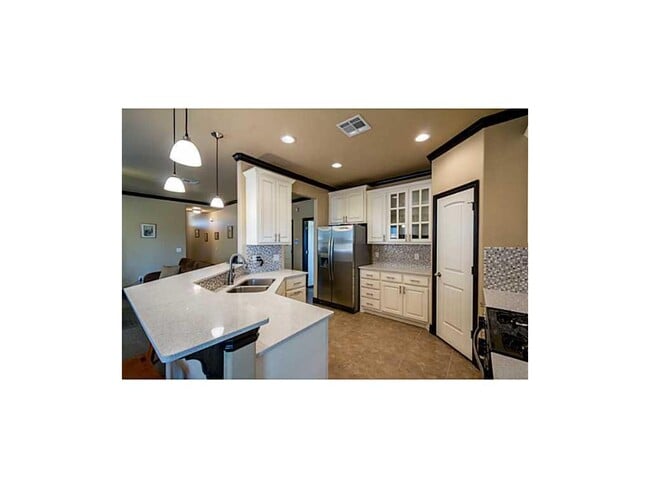 Building Photo - Contemporary Home + Wood Floors + Storm Shelter + Edmond Schools