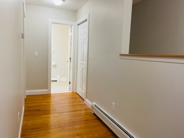 Wide hallway leading to bedrooms and bath - 32 Westville Ave