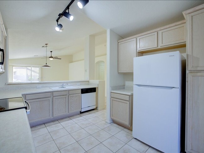 Building Photo - Spacious Living in a Gated Community with Resort-Style Amenities!