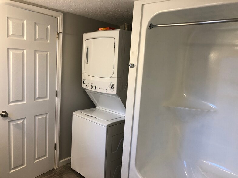 Stackable washer/dryer in bathroom - 184 Wickins Dr