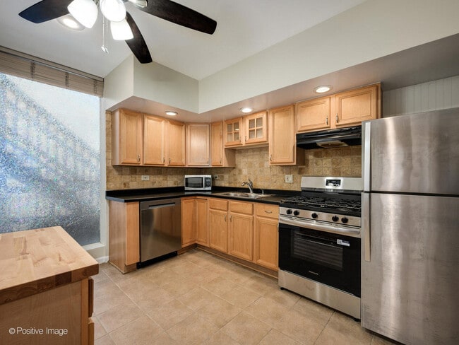 Building Photo - 1244 W Race Ave