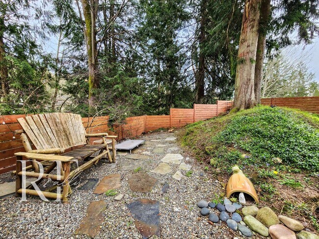 Building Photo - Light-Filled View Home with Vaulted Ceilings & Warm Wood Finishes