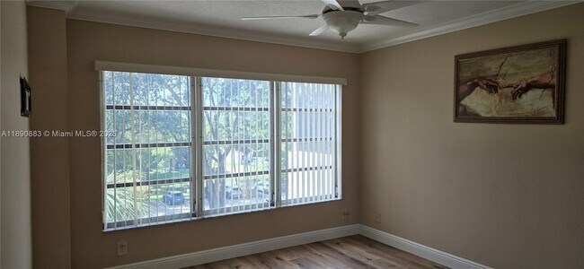 Building Photo - 10777 W Sample Rd