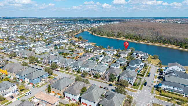 Building Photo - Luxury Waterfront Pool Home in Laureate Park | 4BR + Water Views