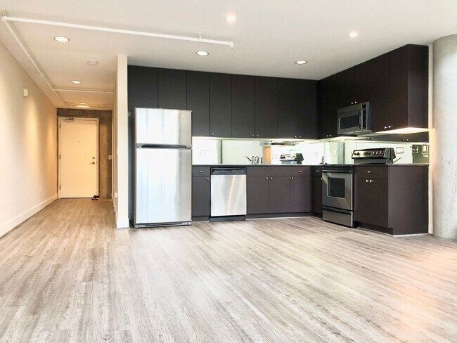 Building Photo - Jack London Square Loft – Newly Renovated, High Ceilings, Prime Location!
