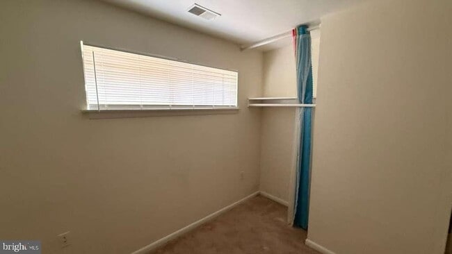 Building Photo - 8103 Greenspring Way