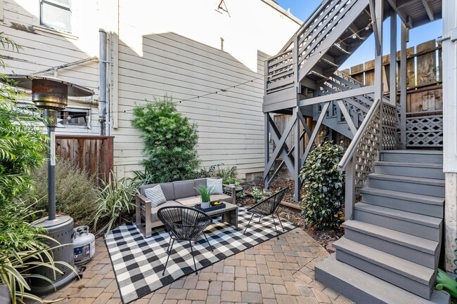 Building Photo - Bernal Heights: Remodeled Unfurnished Top Floor Condo w/ Garage Parking & Shared Yard