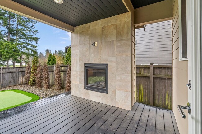 Building Photo - Backyard Putting Green + Outdoor Fireplace | Comfortable Puyallup Rental