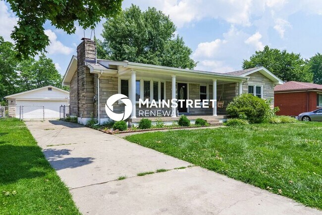 Building Photo - 8003 Canna Dr