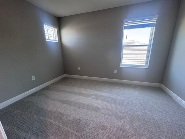 Building Photo - New Construction in Grand Park-4 Bedrooms and 4 Bathrooms with a Den and a Loft! No deposit for q...