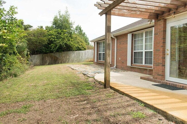 Building Photo - Spacious 4-Bedroom Sanctuary in gated comm...