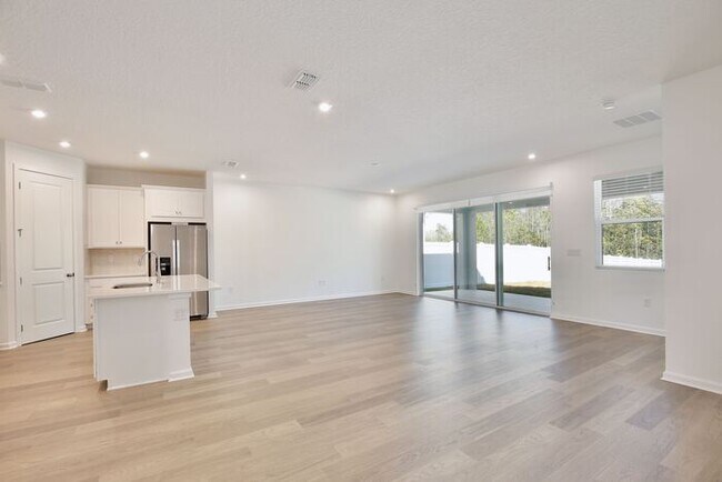 Building Photo - Thoughtfully Designed 4/3 Home with Premium Upgrades and 2 Car Garage! Available Now!