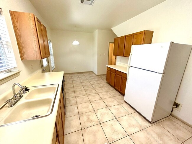 Building Photo - *COMING SOON* Gorgeous Two Story Three Bedroom Home!