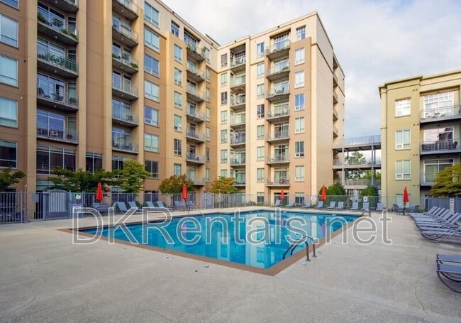 Building Photo - 711 Cosmopolitan Dr NE