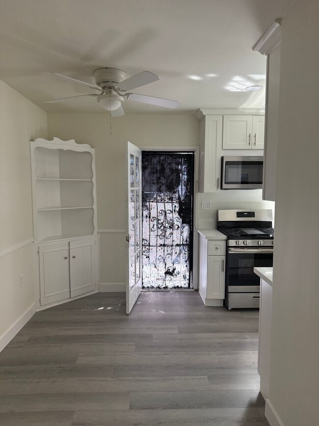 Building Photo - FOR RENT — COMPLETELY REMODELED Apartment