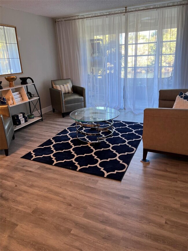 Building Photo - 9070 Lime Bay Blvd