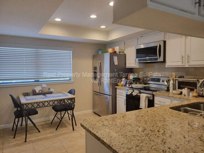 Building Photo - 12310 Capri Cir N