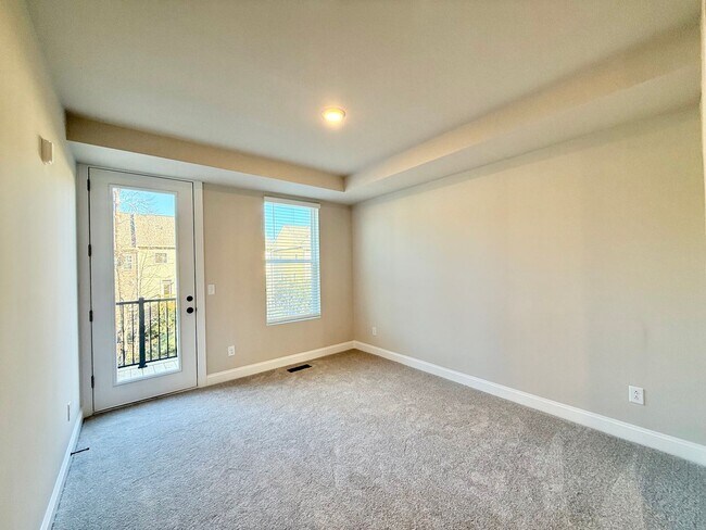 Building Photo - Stunning New Construction 2BD, 2.5BA Cary Townhome-Style Condo with a 1-Car Garage & Bonus Flex S...