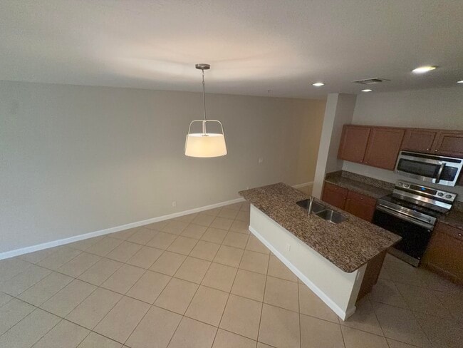 Building Photo - 9491 SW Merlin Ct