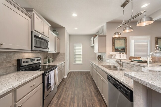 Building Photo - Now Pre-Leasing for August 2026! Well Appointed Townhomes with Fenced Backyards Close to Bus Stop...