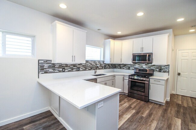 Building Photo - COMING SOON! Beautiful and modern two stor...