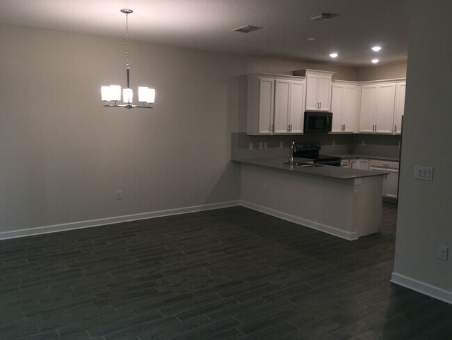 Building Photo - BEAUTIFUL CHAMPIONSGATE HOME WITH LAKE VIEW