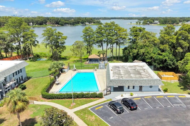 Building Photo - "Bright 2-Bed, 2-Bath Condo Retreat with Pool & Lake Views"