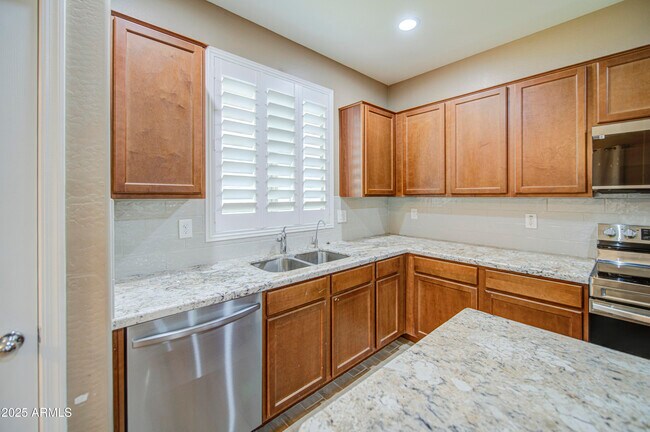 Building Photo - 6826 W Charter Oak Rd