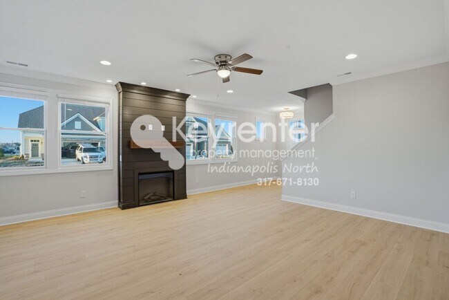 Building Photo - Located in Westfield, IN, this attractive 3-bedroom, 2.5-bath home sits on a corner lot within an...