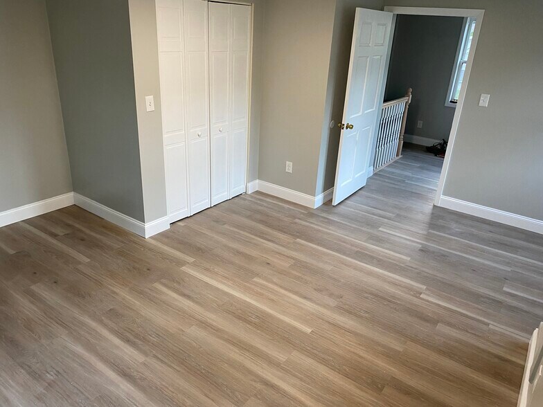 Large upstairs bedroom. - 3054 S Pike Ave