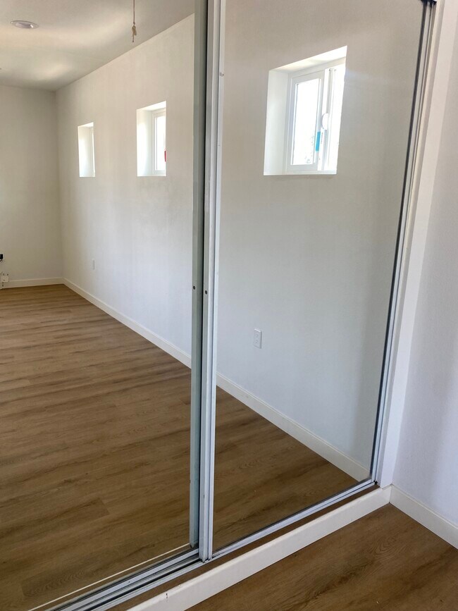 Closet doors both closed - 22002 Prairie St