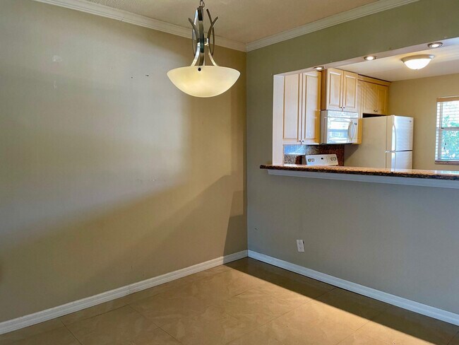 Building Photo - 608 SW Natura Blvd