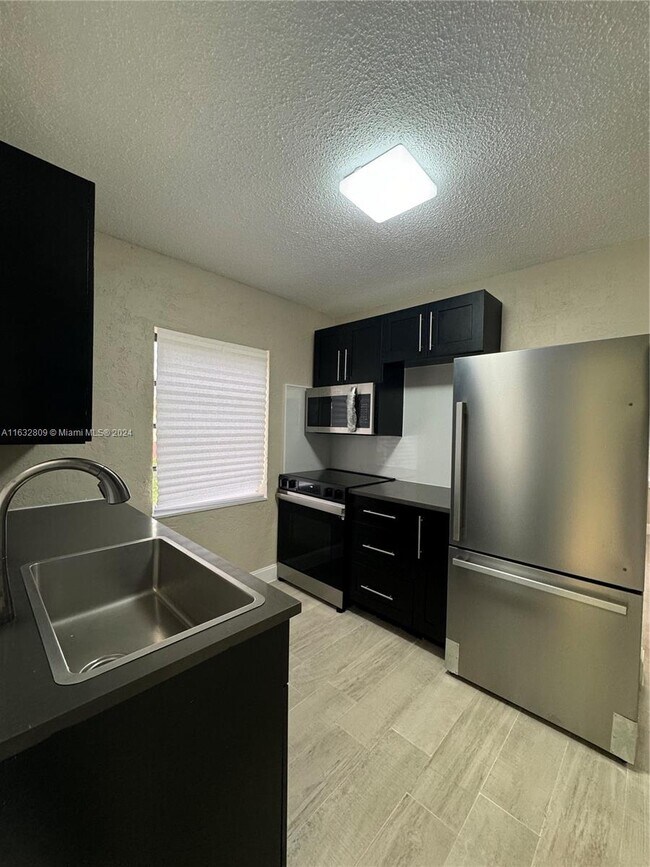 Building Photo - 5708 NW 11th Ave