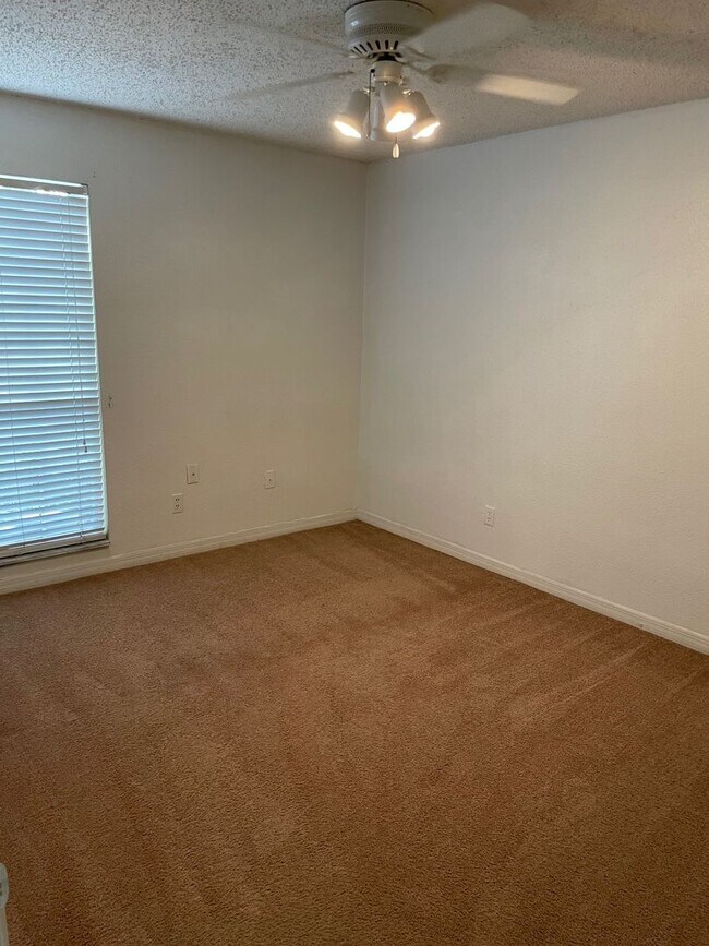Building Photo - Ground Floor Two bedroom condo