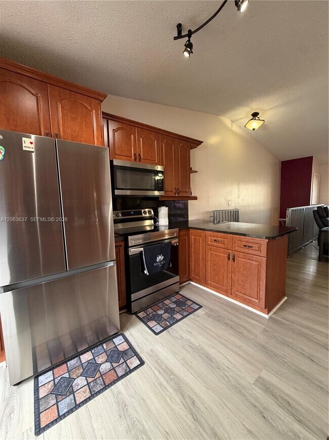 Building Photo - 7878 W 29th Ln