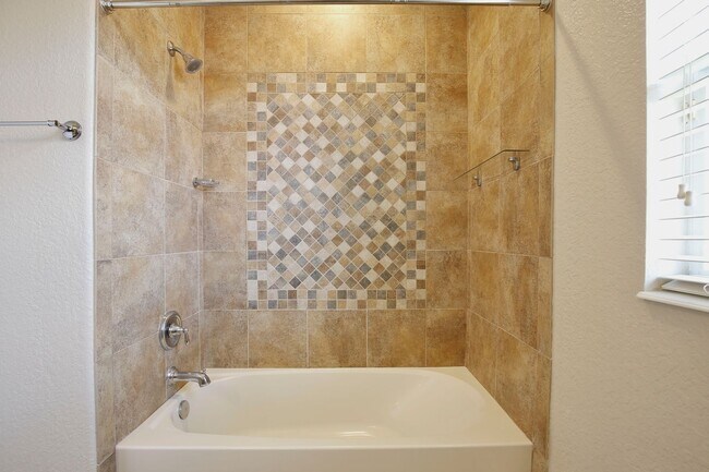 Building Photo - Stylish and Spacious 3/2.5 Townhome with Premium Features and Community Pools